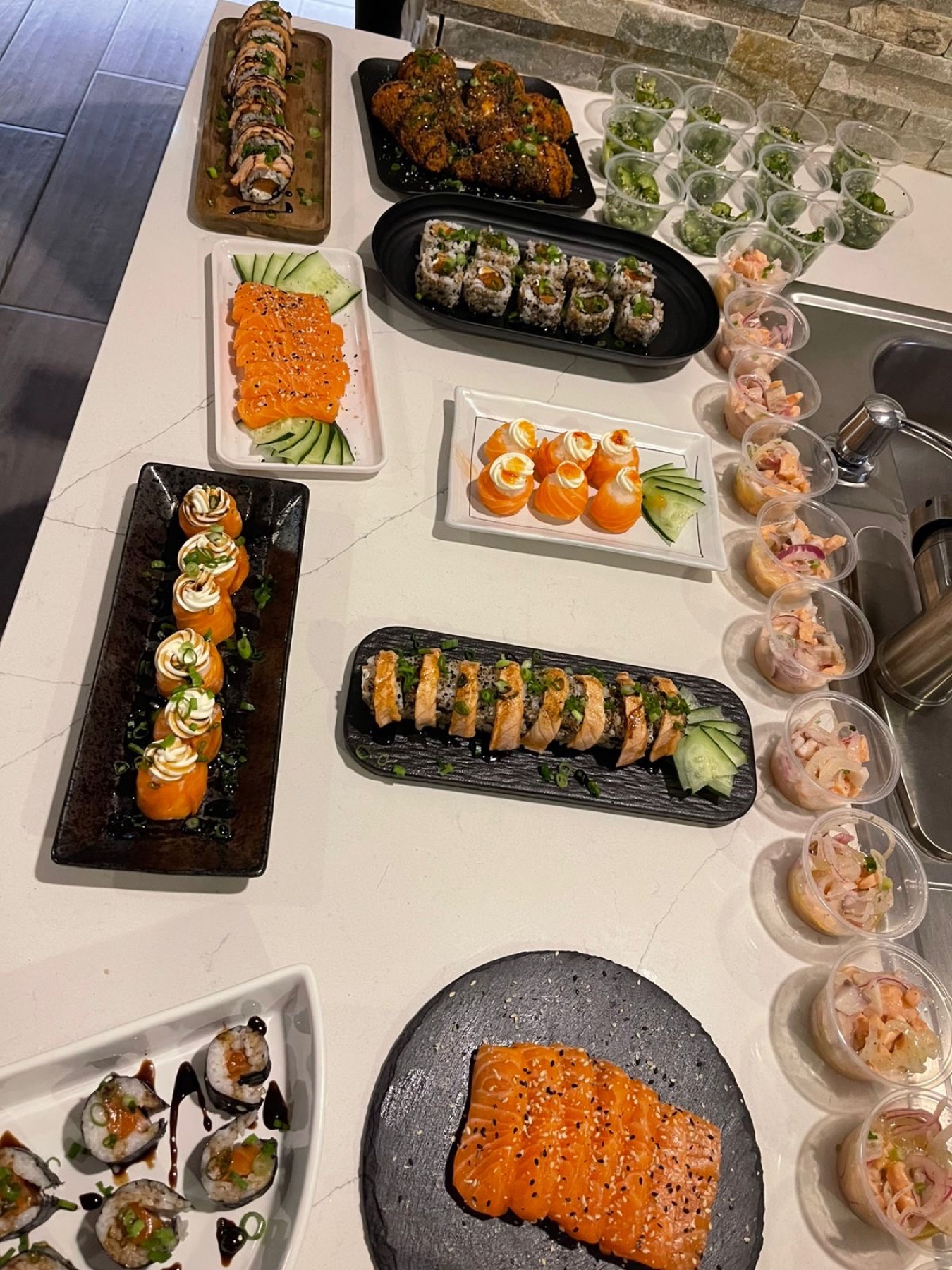 A large catered sushi spread